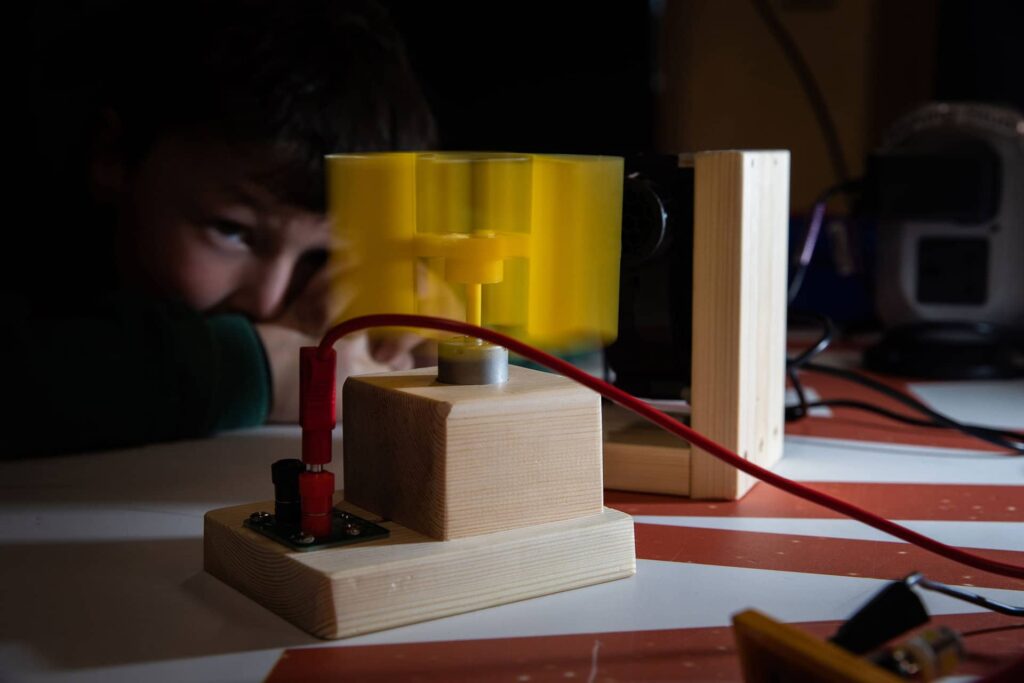 Students learn how to operate electrical circuits on this schools' workshop.