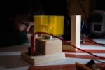 Students learn how to operate electrical circuits on this schools' workshop.