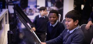 Students learning in Mission Control, a hands-on exhibit in Life Science Centre's Space Zone.