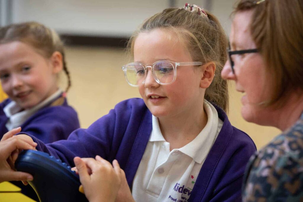 A North East student with teacher at a Life Science Centre school workshop.