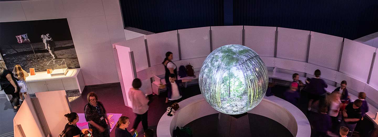 Students around Life's Sphere taking part in the Where on Earth schools' workshop.