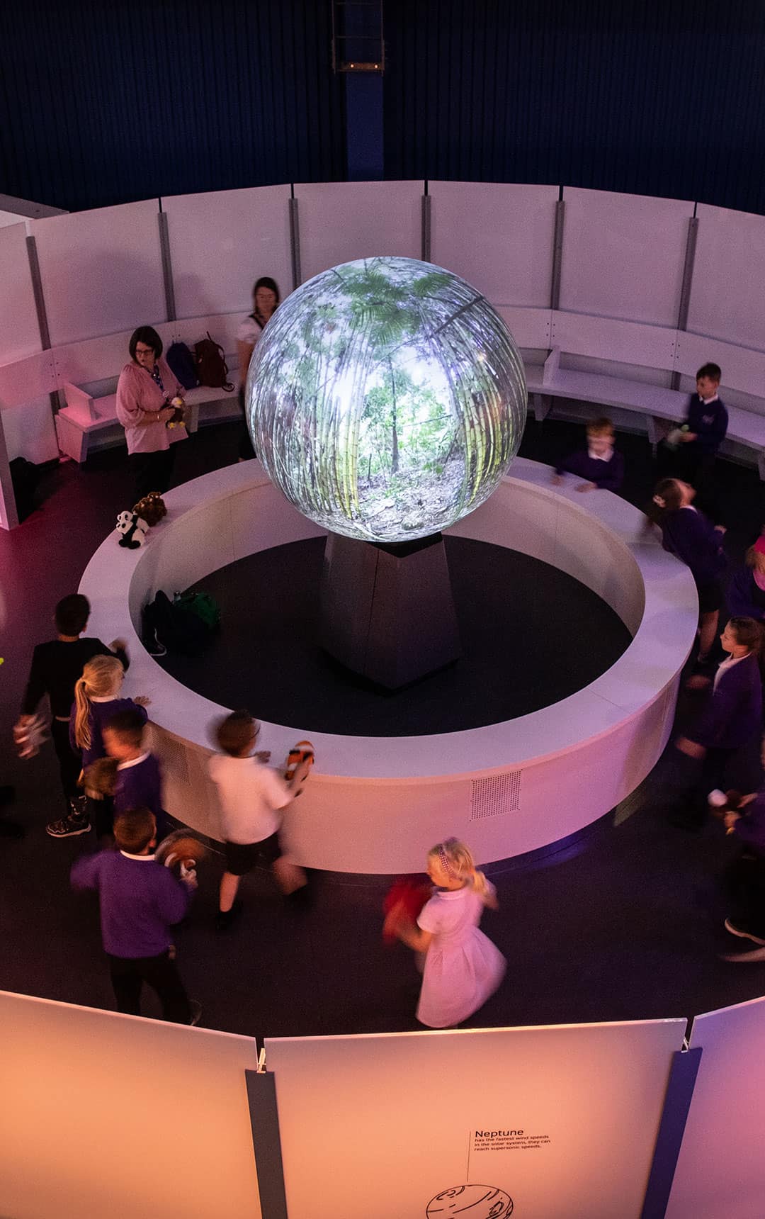 Students around Life's Sphere taking part in the Where on Earth schools' workshop.