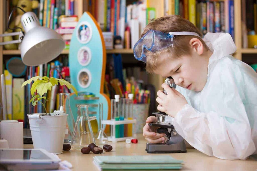 Child experimenting and learning about science at home