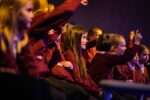 School children in Life Science Centre's theatre watching a live science show.
