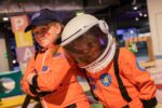 School children dressed as space rangers in Life Science Centre's Play Zone.