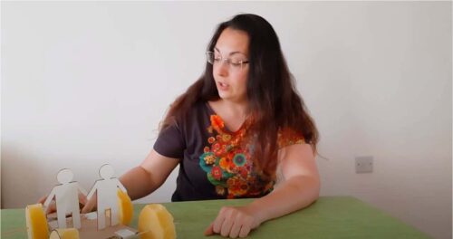 A Life explainer showing a science demo to students remotely.