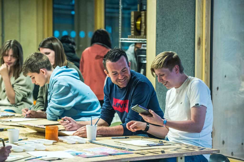 Adults Enjoying A Craft Making Activity Inside Life Science Centre's Making Studios