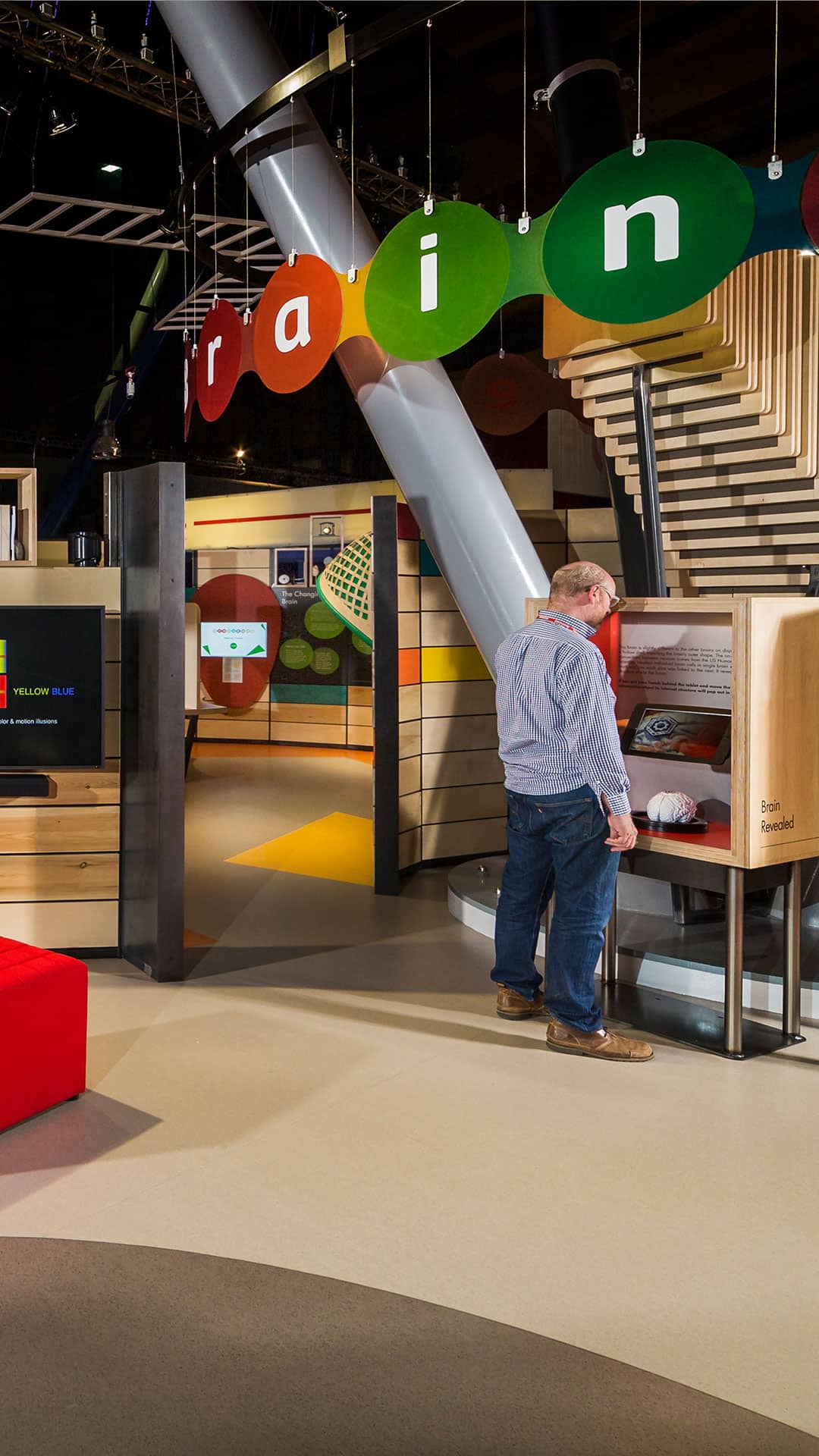 Man looking at object in Life Science Centre's Brain Zone.