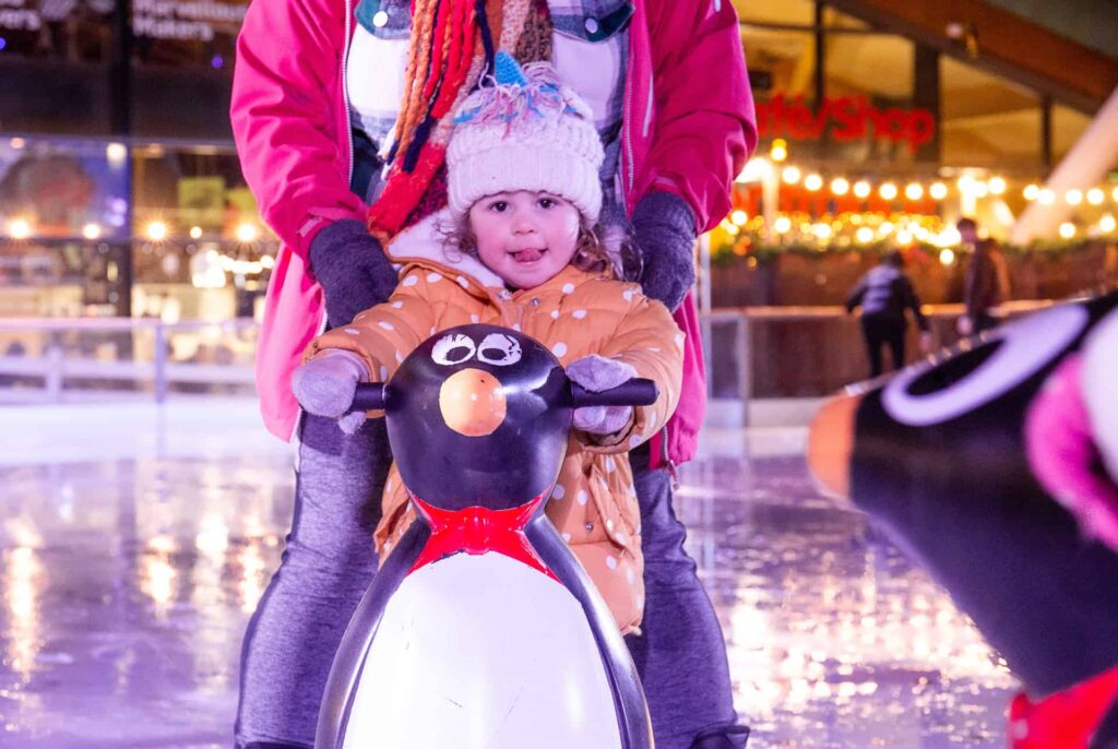 Young child skating on Life Science Centre's Newcastle city centre outdoor ice rink