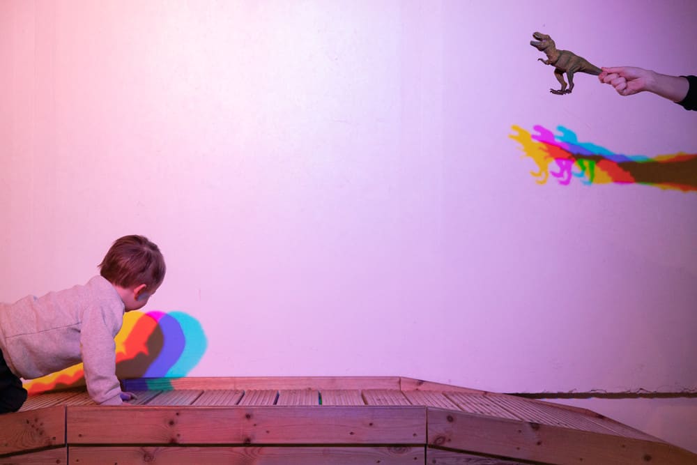 Toddler Enjoying Lightplay In Play Zone.