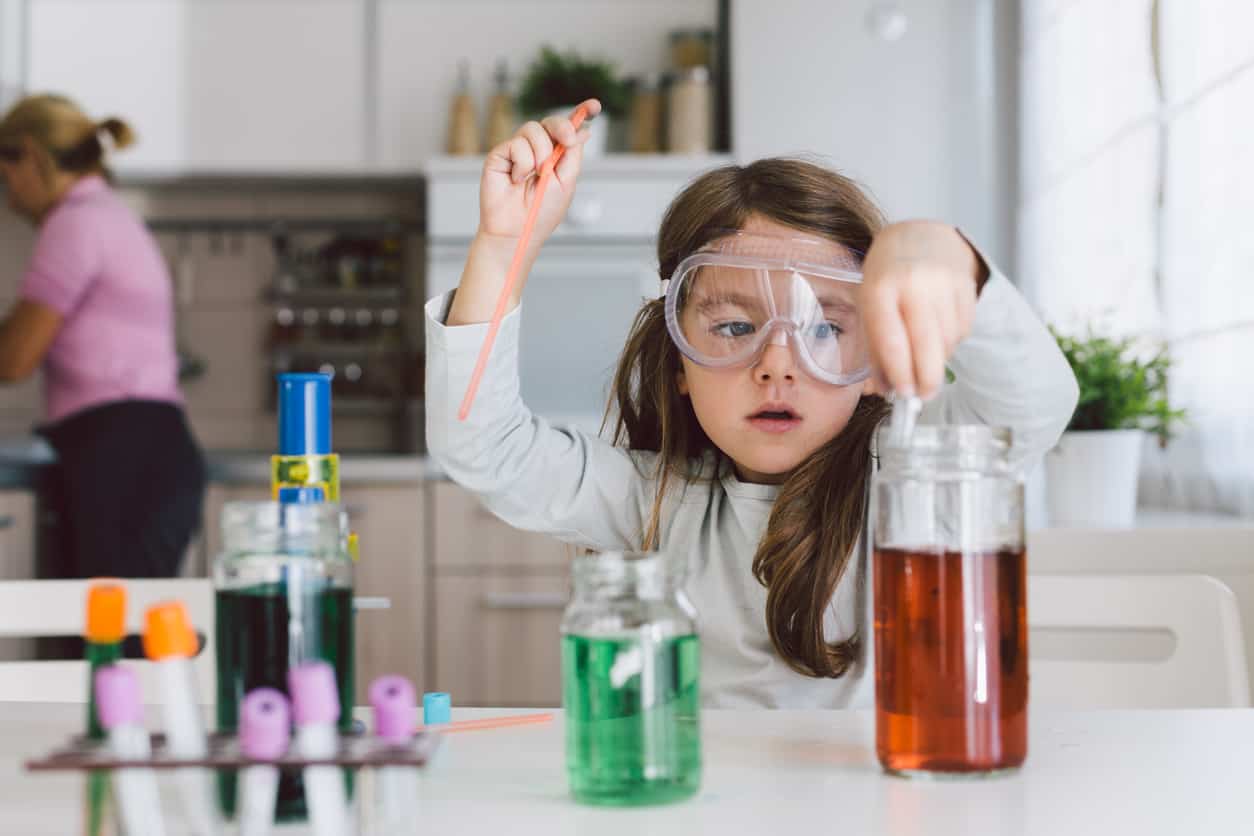 Child Playing Science In The Kitchen