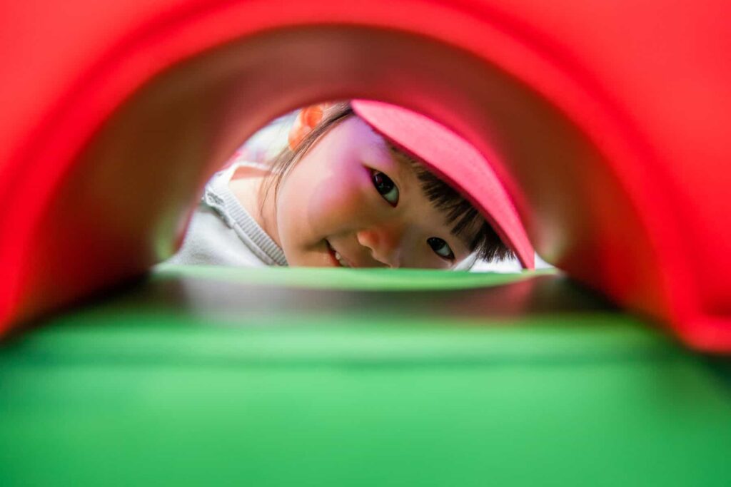Little girl enjoying soft play at Life Science Centre pre-school day.