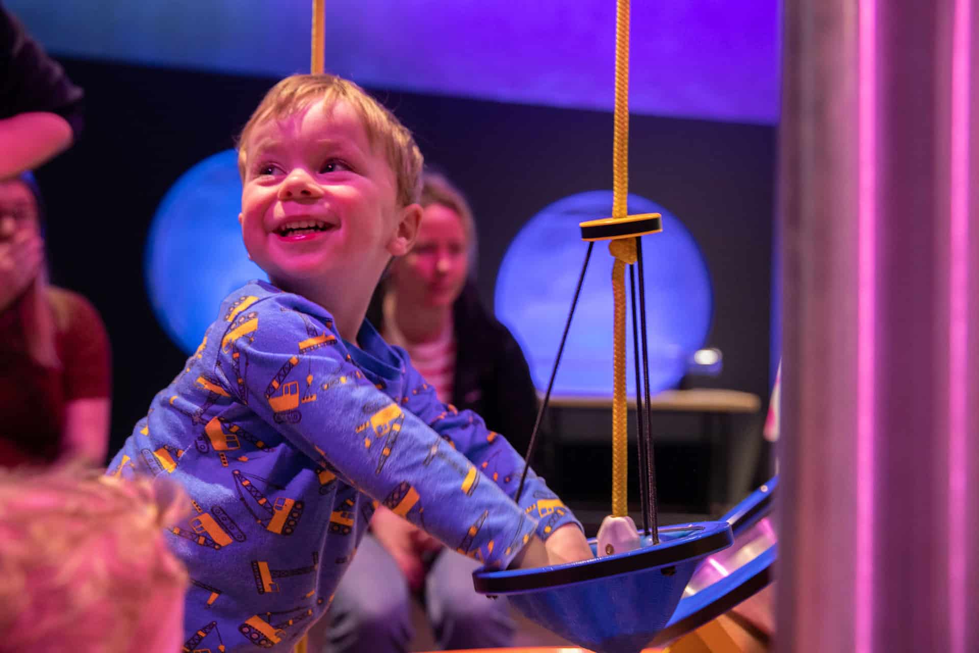 Little boy measuring at a Life Science Centre Pre-School Day.