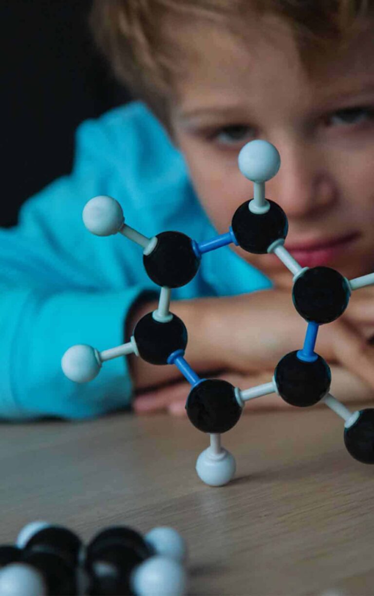 Young boy learning about molecules at Life Science Centre Takeover Day.
