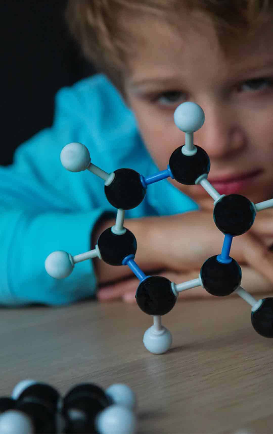 Young boy learning about molecules at Life Science Centre Takeover Day.