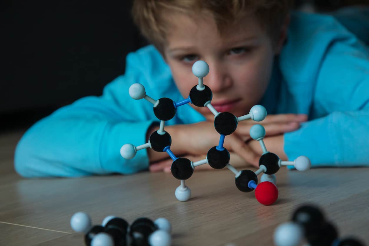Young boy learning about molecules at Life Science Centre Takeover Day.