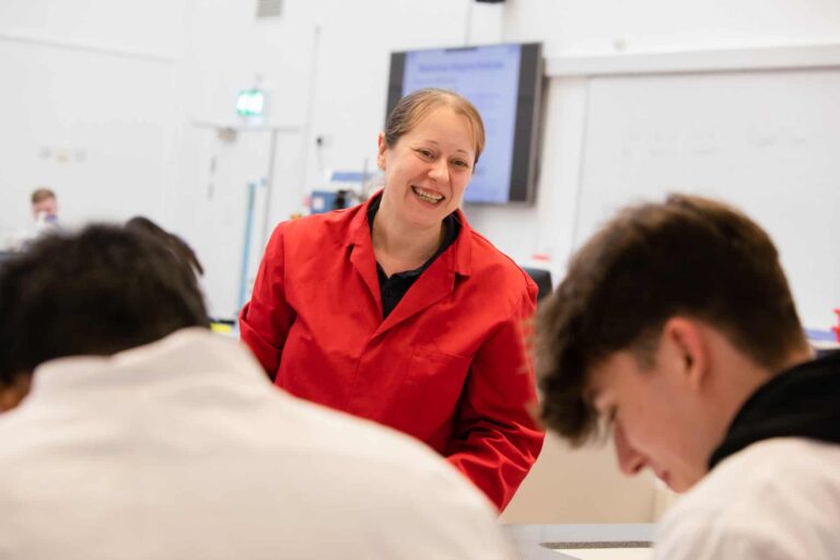 Science Explainer during delivering workshop to two male students.