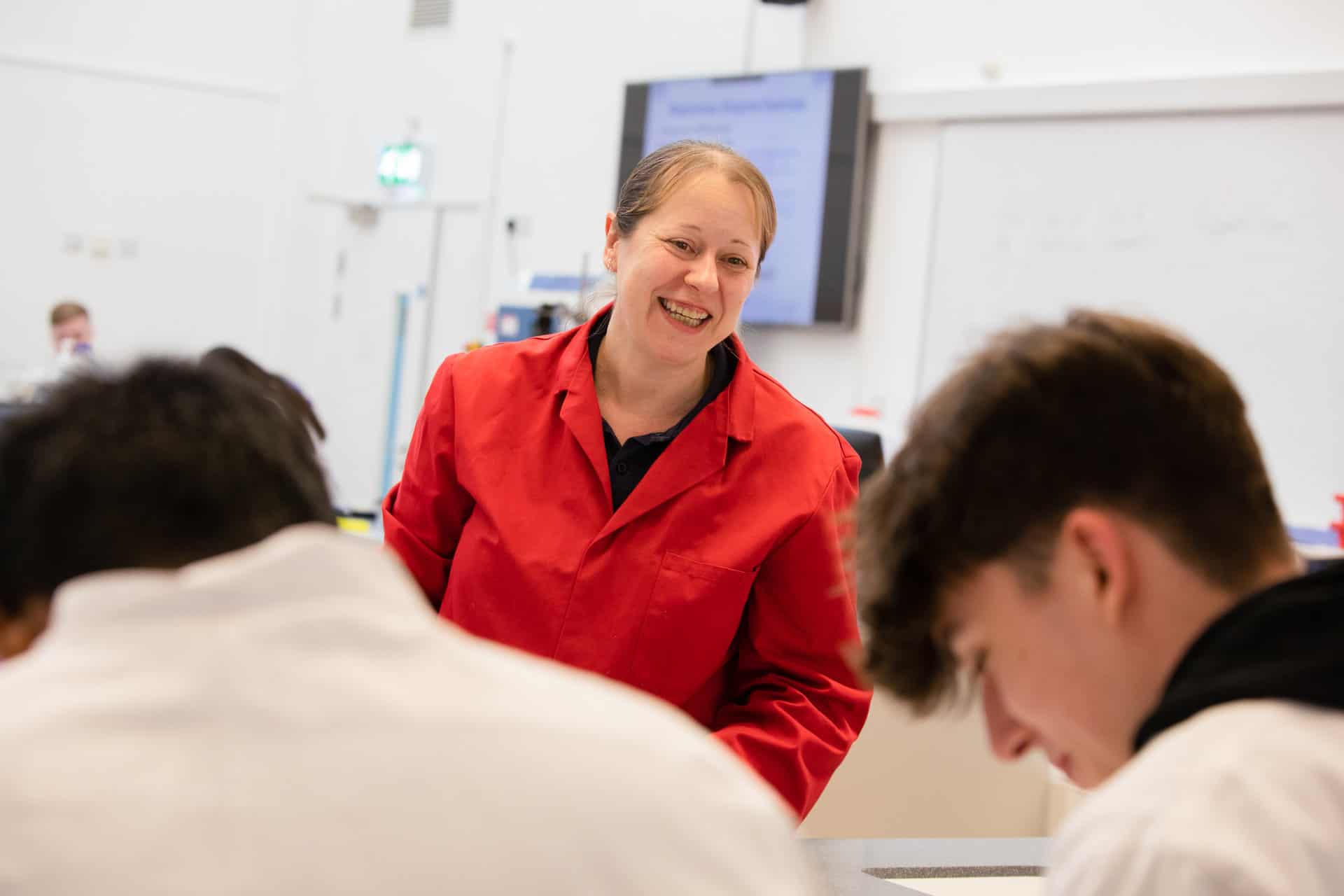 Science Explainer during delivering workshop to two male students.