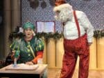 Santa and elf doing fun science demonstration at Life Science Centre.