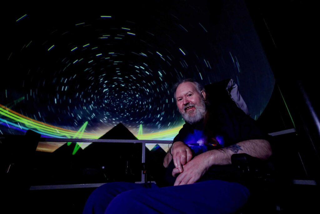 Lifelong Pink Floyd fan Peter Smith pictured in Life Science Centre's planetarium about to watch 'The Dark Side of the Moon'.