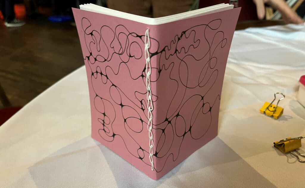 Families can make a handmade notebook in The Making Studios.