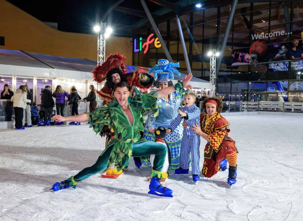 The cast of Tyne Theatre's panto on Life's seasonal outdoor ice rink.