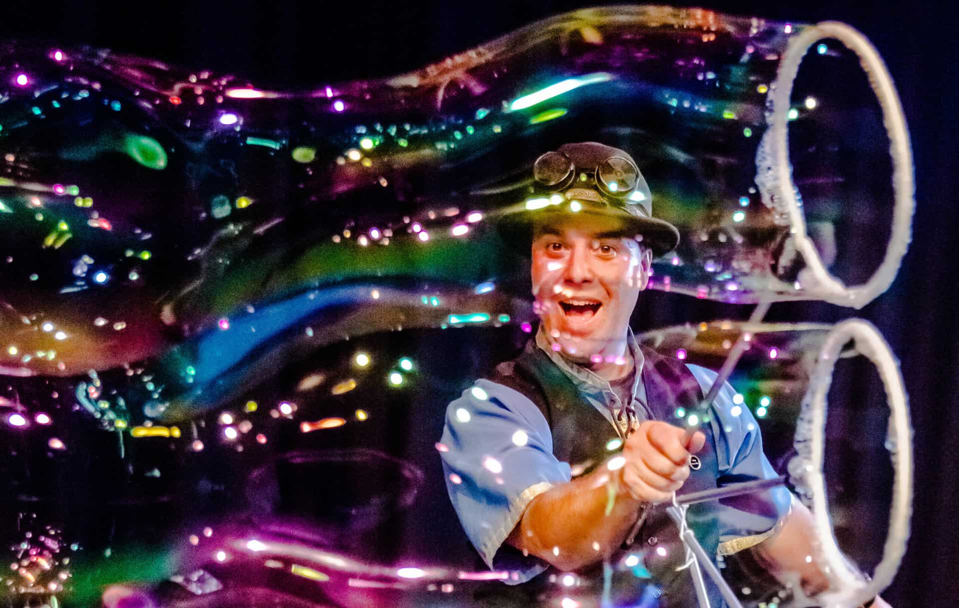 The Highland Joker creating colourful bubbles of all shapes and sizes.
