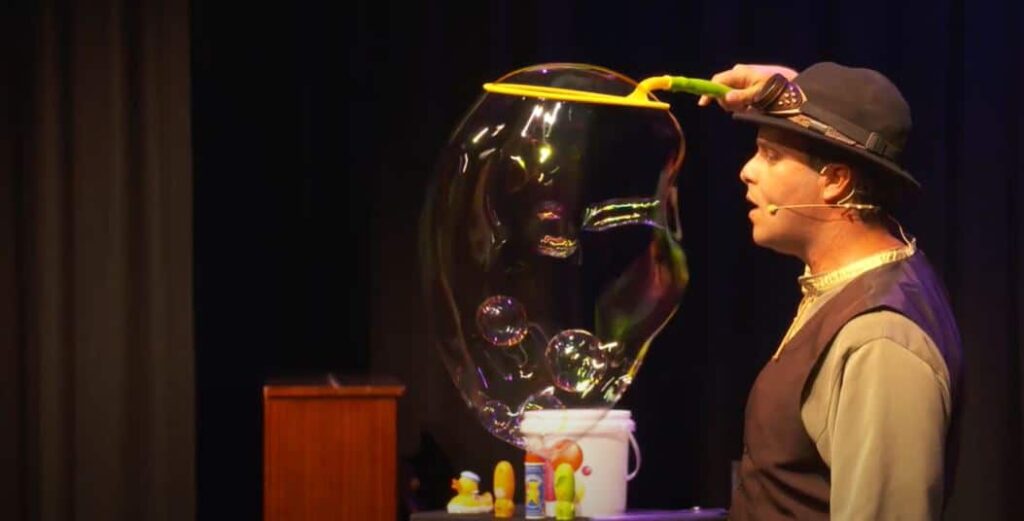 The Highland Joker creating colourful bubbles of all shapes and sizes.