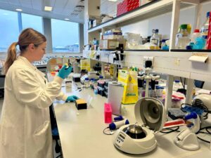 Newcastle University PHD student Sarah Orr completing science experiment.