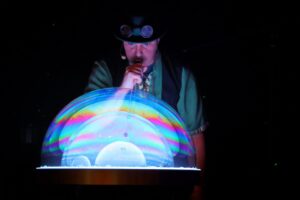 The Highland Joker blowing a large bubble during show.