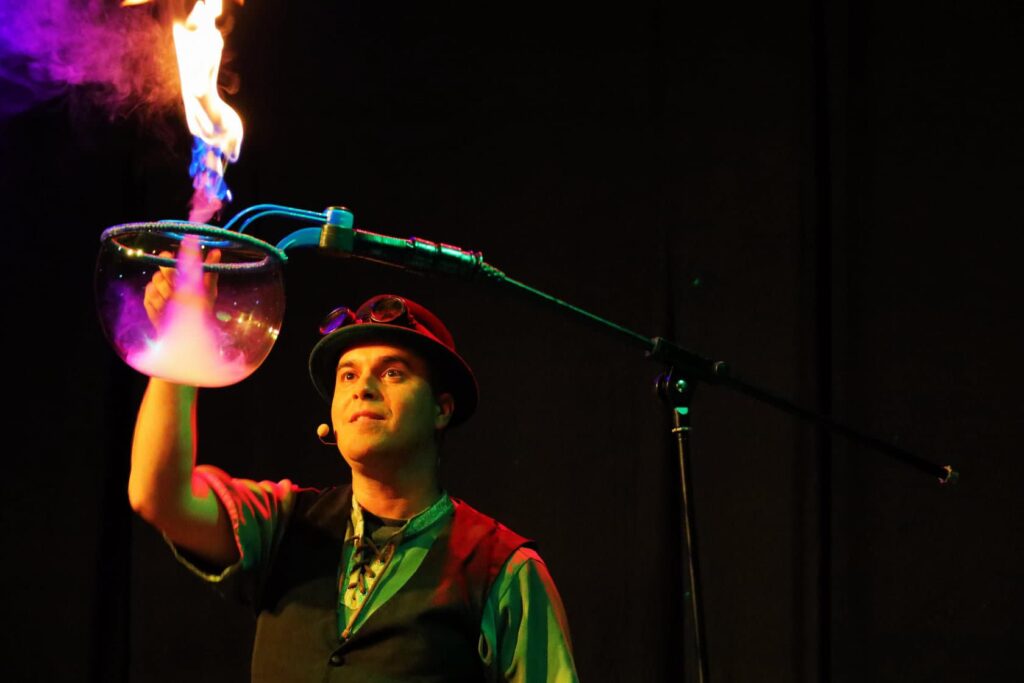 The Highland Joker setting a bubble on fire during show.