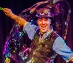 The Highland Joker In Giant Bubble During Exciting Science Show.