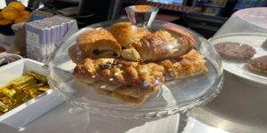 Times Square Cafe Pastries and cakes displayed next to Times Square Cafe Menu
