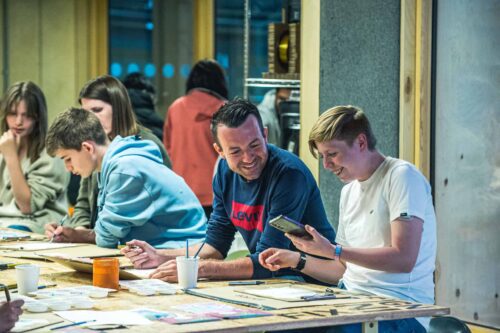 Making Studios enjoying craft making activity.