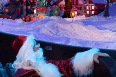 Santa sat looking up in Life Science Centre's planetarium portrait