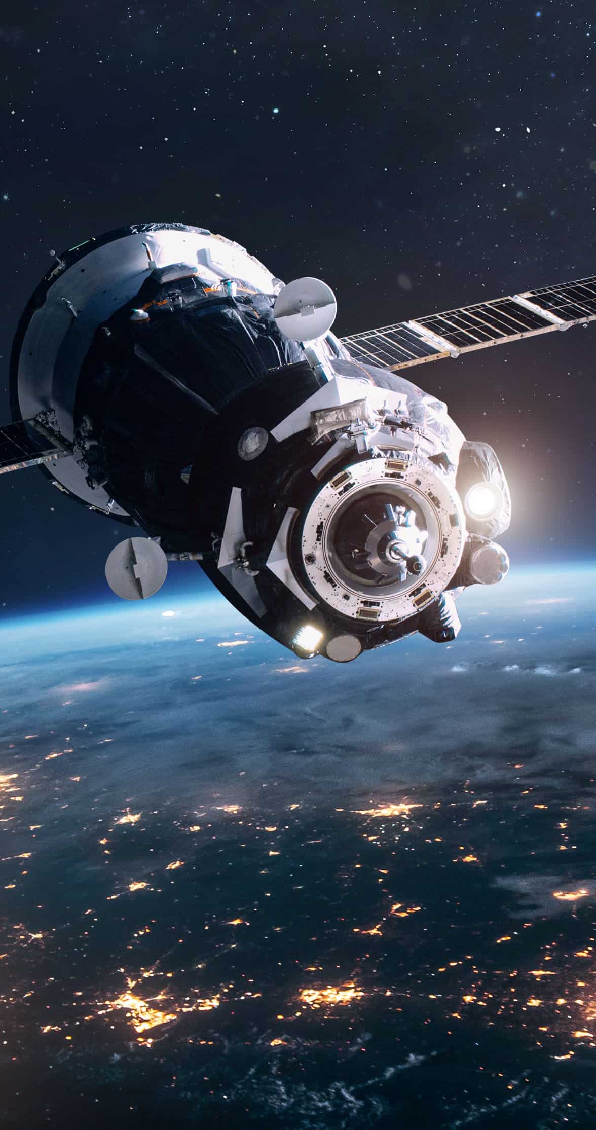 Space ship on orbit of Earth planet. Expedition of cargo spacecraft to ISS. Deep space and cities lights. Elements of this image furnished by NASA.