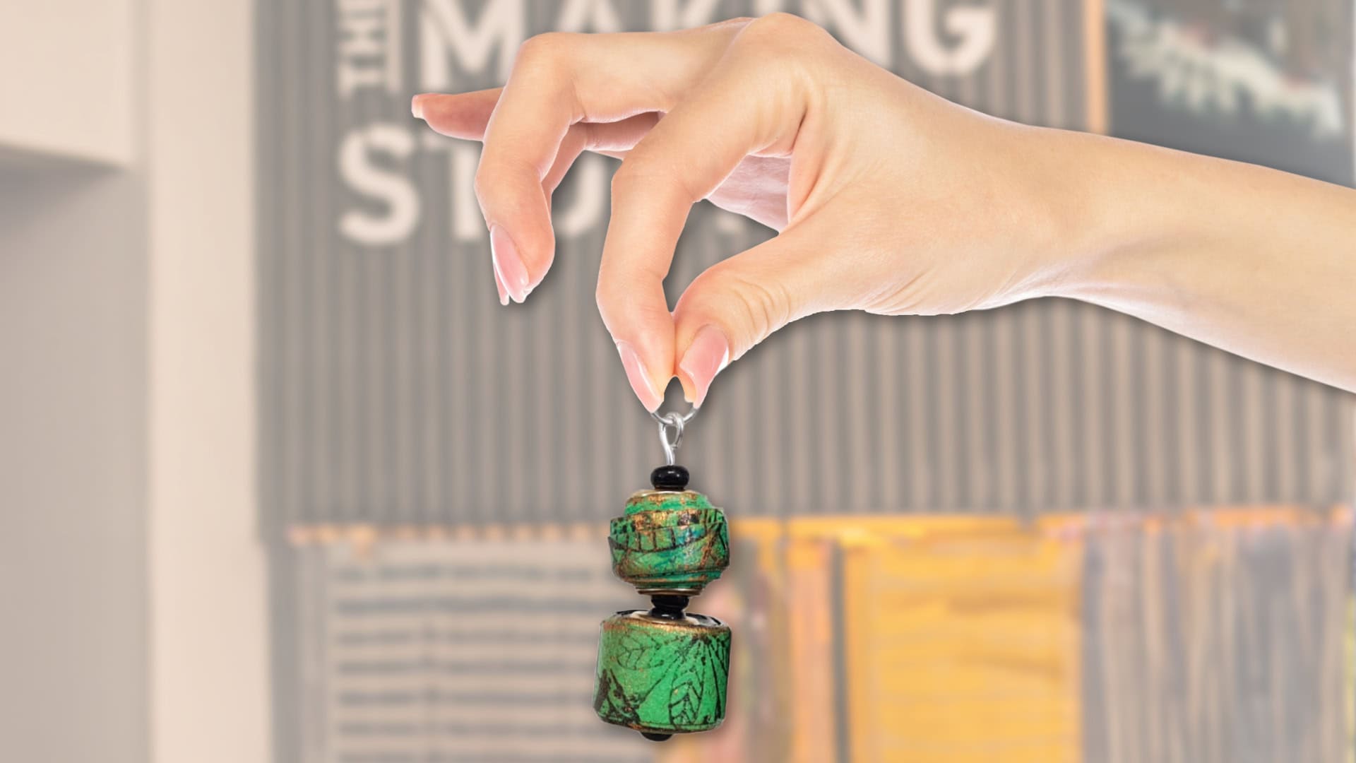 Hand made green earring made during Life Science Centre crafting workshop.