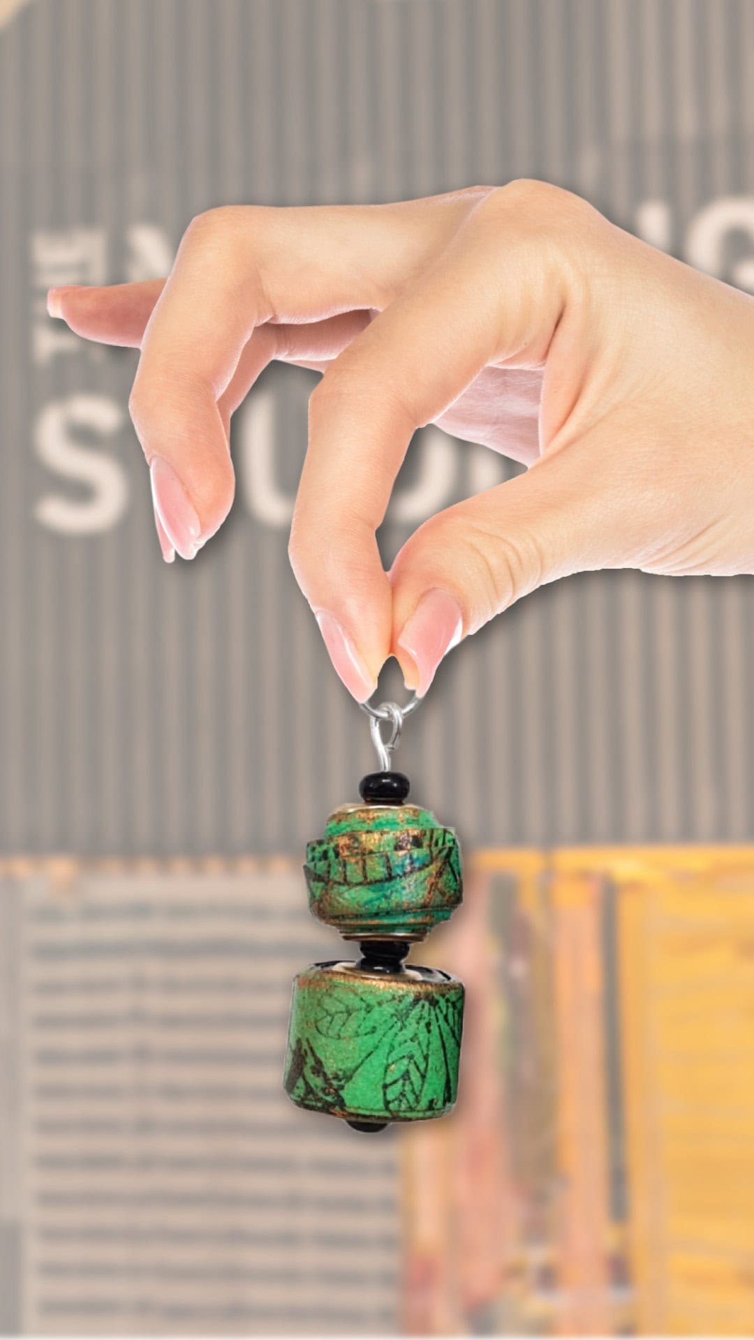 Hand made green earring made during Life Science Centre crafting workshop.