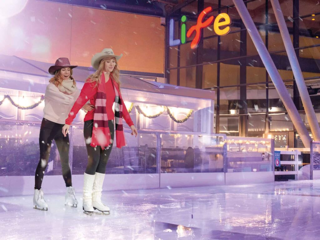 Women Wearing Cowgirl Hats During Taylor Swift Night At Newcastle's Outdoor Ice Rink