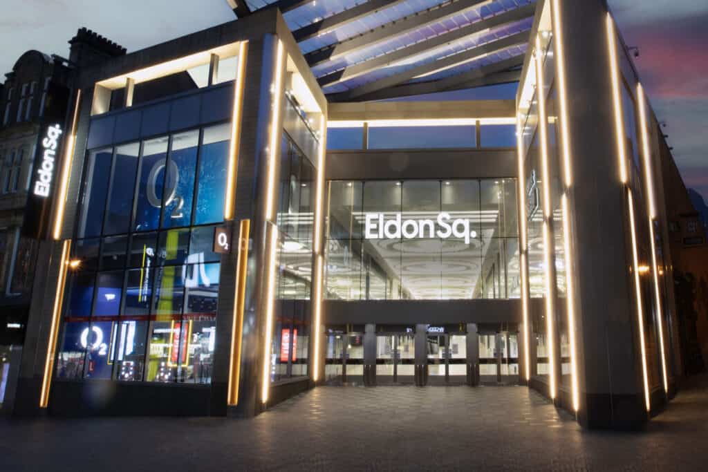 The entrance of Newcastle Upon Tyne's Eldon Square shopping centre, during the evening.
