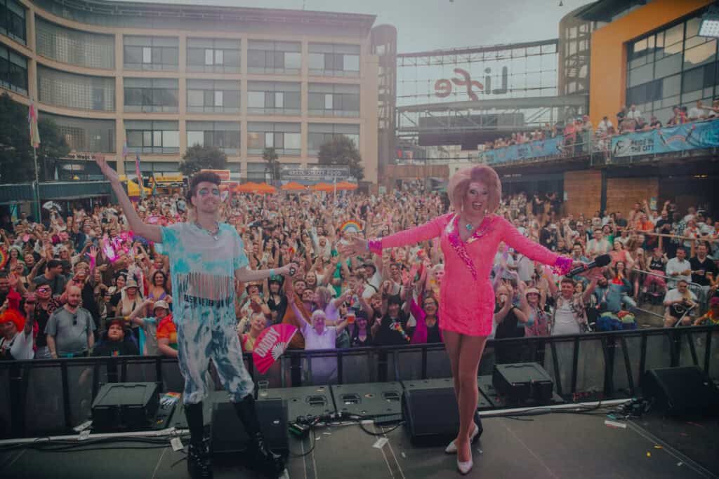 Crowds pose for a group photo at Pride in the City in Newcastle.