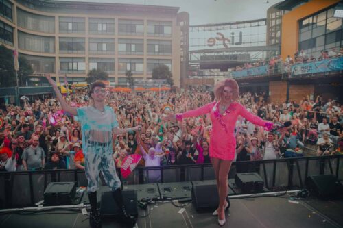Crowds pose for a group photo at Pride in the City in Newcastle.
