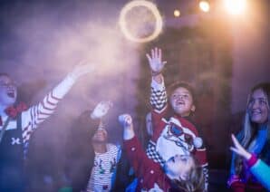 Children playing with smoke rings during a Santa Experience session at Newcastle's Life Science Centre.
