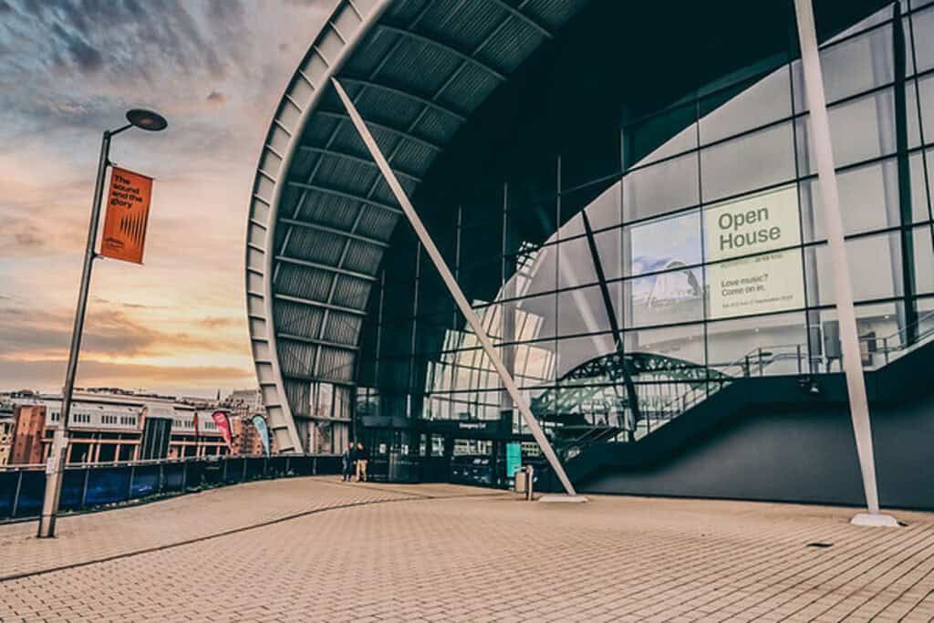 The front of The Glasshouse, showing the entrance and part of the Newcastle Upon Tyne skyline