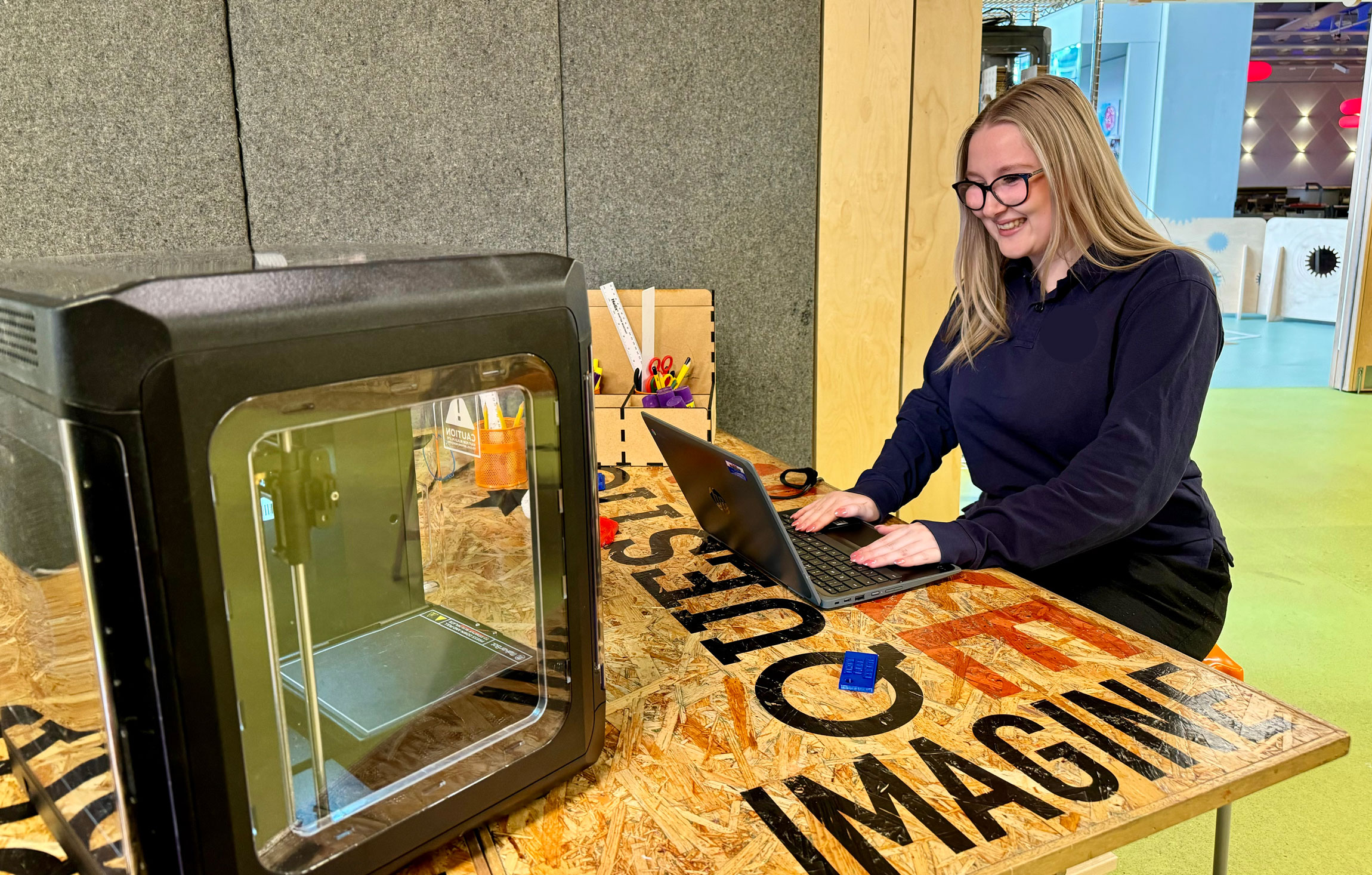Adult female taking part in 3D printing workshop at Life Science Centre.