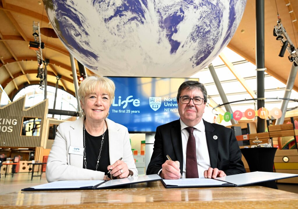 Linda Conlon and Professor Andy Long, pictured in Life Science Centre, under Gaia, signing a joint strategic partnership document.