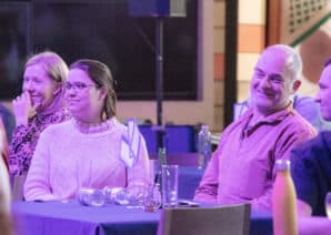 Adults enjoying an evening debate at Newcastle's Life Science Centre.