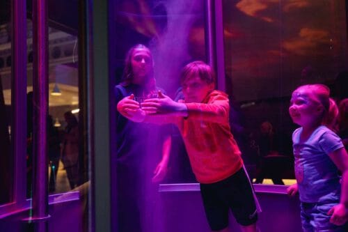 Children experimenting with a tornado in Life Science Centre's Lightbox.