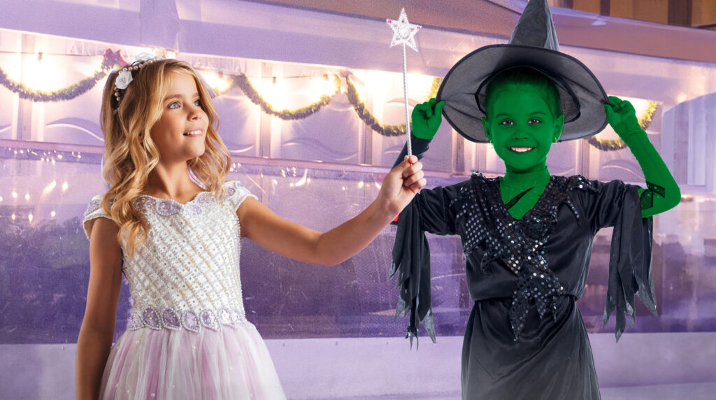 Children dressed as Glinda and Elphaba from the movie Wicked on Life Science Centre's ice rink.