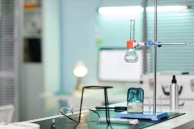 Laboratory Glassware And Equipment Arranged For Scientific Experimentation